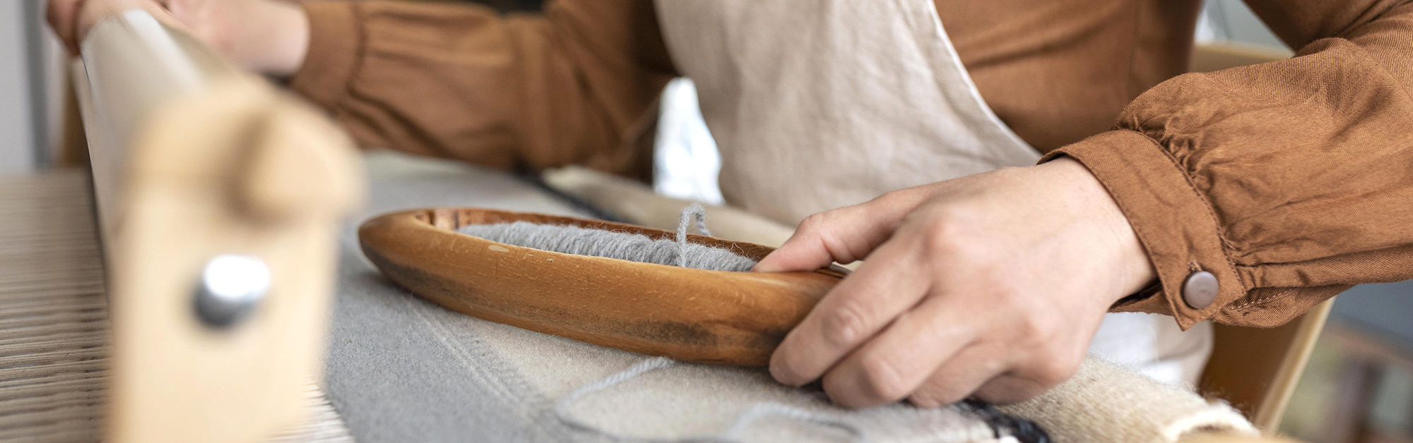 Person working in an embroidery workshop